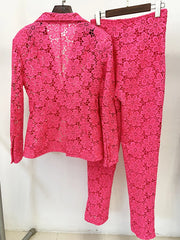 Back view of a rose pink Guipure lace blazer and pencil pants suit on hangers