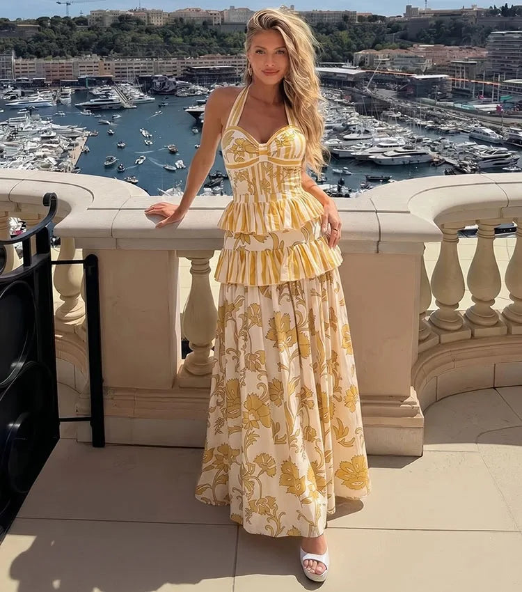 Yellow patterned halter neck top and tiered skirt swimwear set
