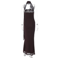 Black evening gown on a mannequin with a white background