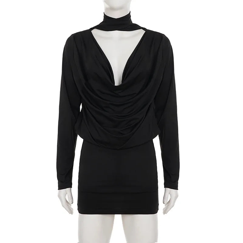 Black long-sleeve dress with draped front on a mannequin against a white background