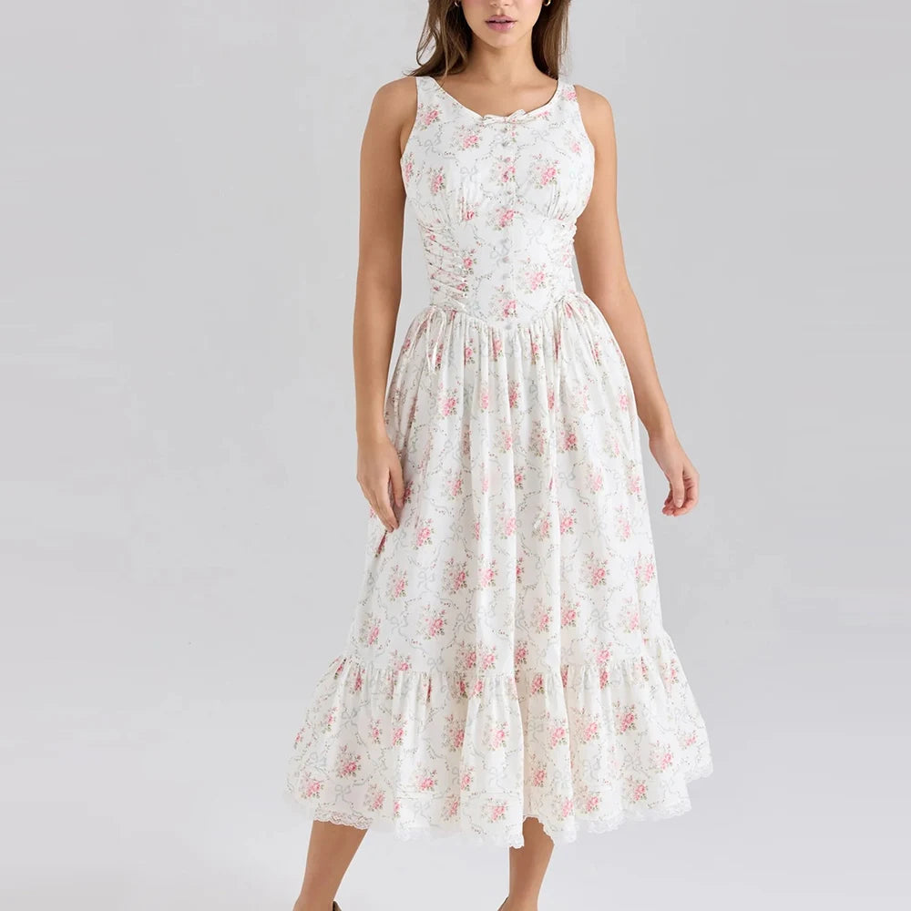 White floral dress worn by a model on a gray background