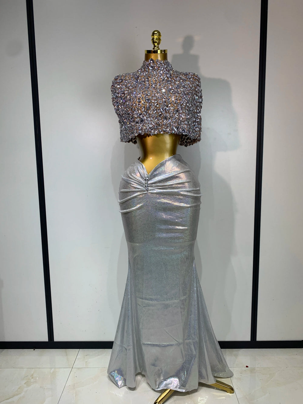 Silver holographic embellished mock neck sleeveless top and draped faux leather maxi skirt set