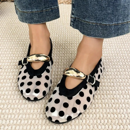 Polka dot mesh ballet flat with a gold-toned buckle strap.