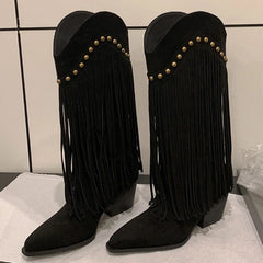 Black pointed toe square heel knee high boots with fringe and studs