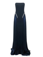 Navy blue strapless evening gown with beaded detailing on a white background