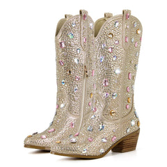 Beige cowboy boots with colorful gemstones on a white background