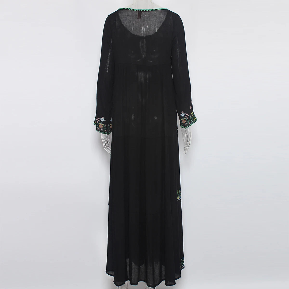 Black long-sleeve dress with floral embroidery