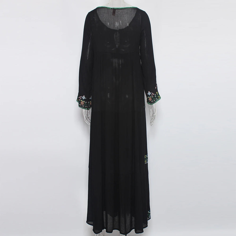 Black long-sleeve dress with floral embroidery