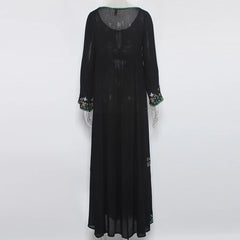 Black long-sleeve dress with floral embroidery