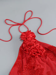 Red floral top with a gray background