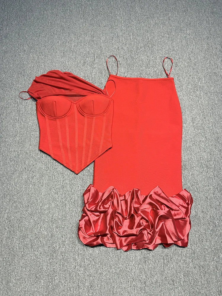 Red satin dress with ruffled hem on a gray background
