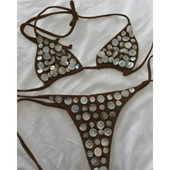 Brown bikini set with circular iridescent button embellishments.