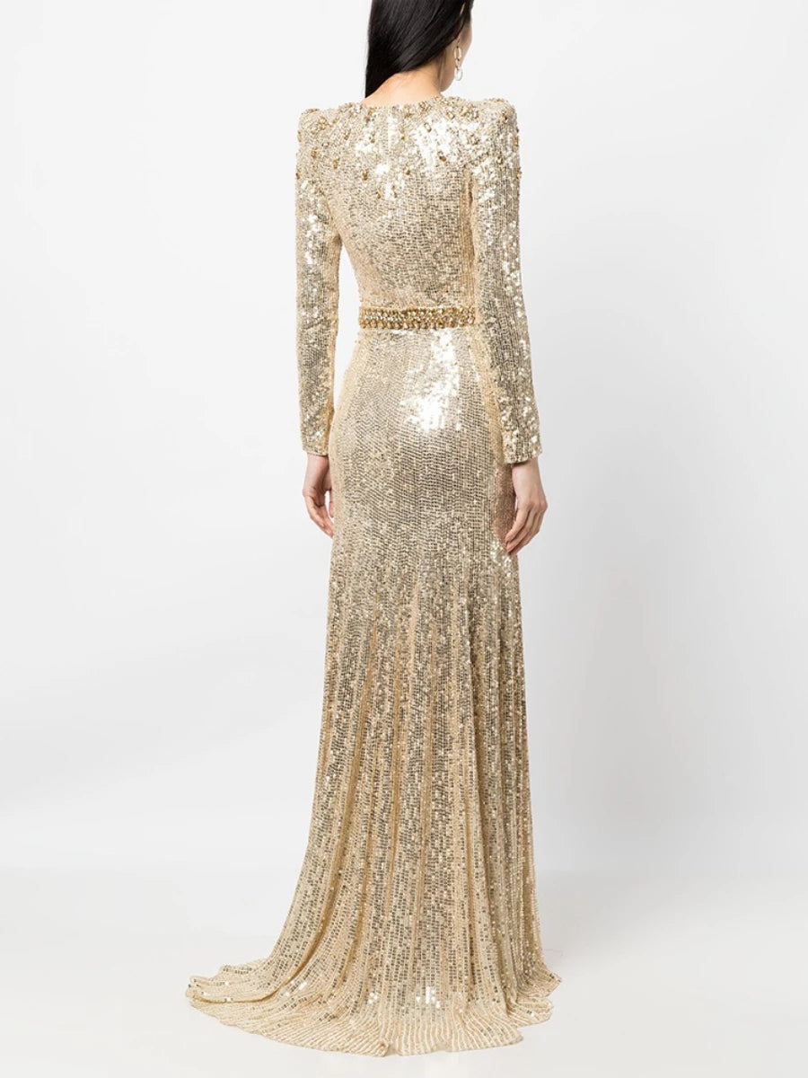 Gold sequin evening gown on a white background