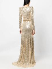 Gold sequin evening gown on a white background