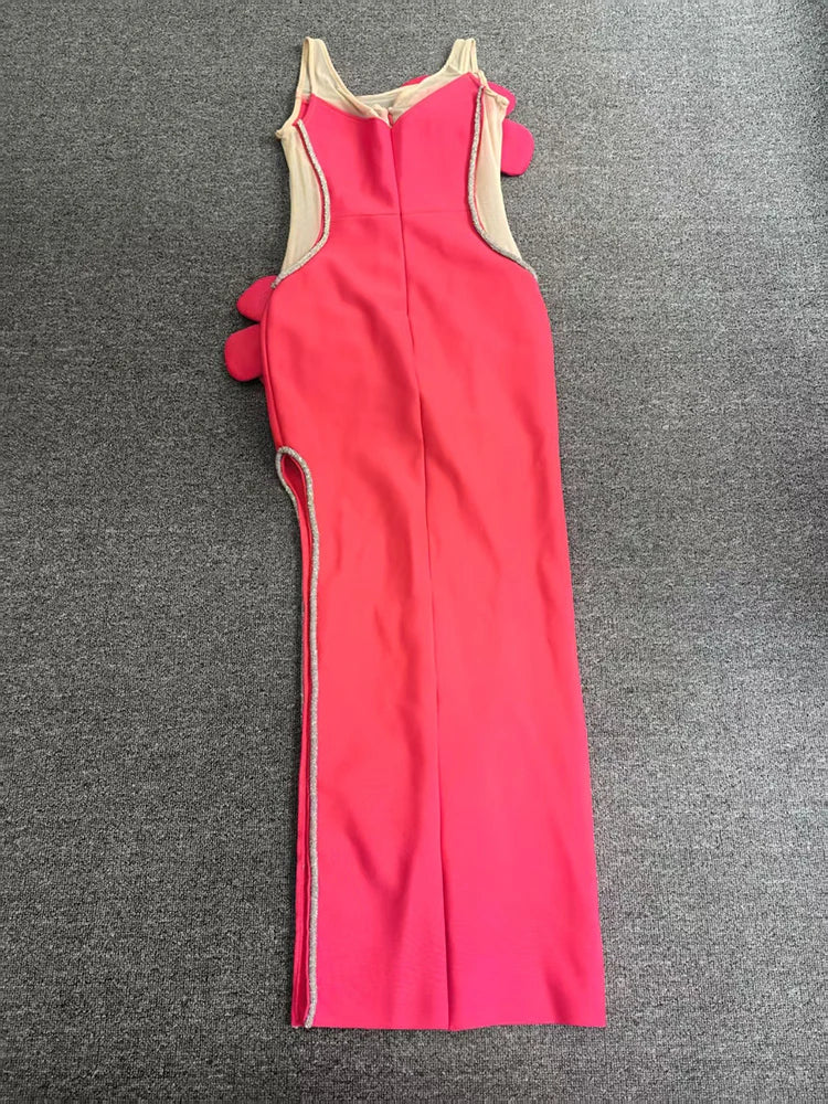 Red jumpsuit with beige accents on a gray background