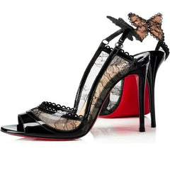 Black lace stiletto heel with peep toe and butterfly accent
