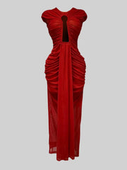 Red evening gown with a cut-out design on a gray background