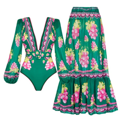 Green swimsuit with long sleeves and grape print, paired with a matching maxi skirt