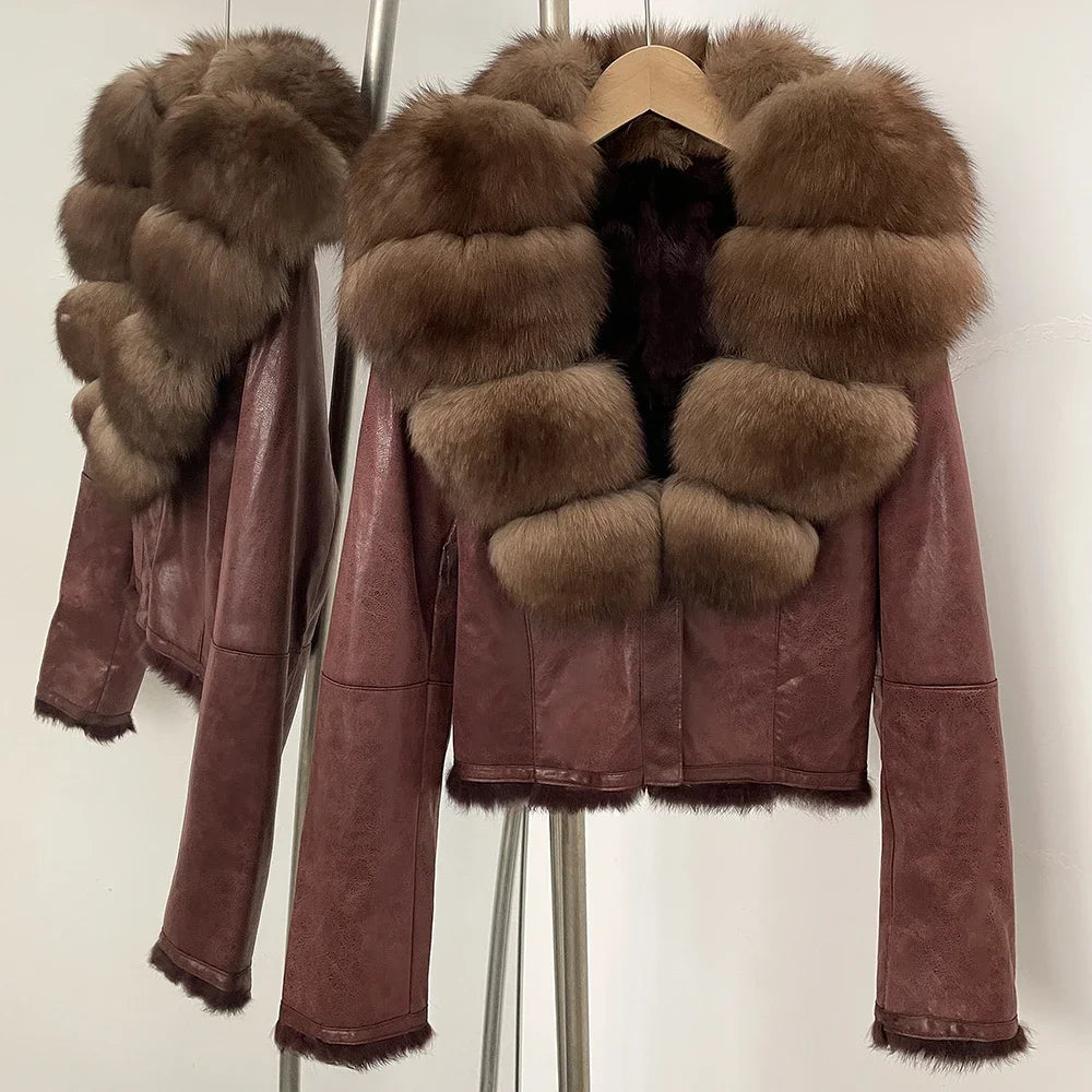 Brown leather jacket with fur trim on a white background