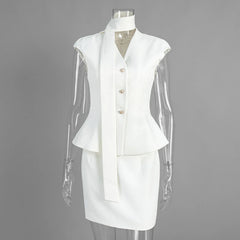 White sleeveless top and skirt set on a mannequin against a gray background