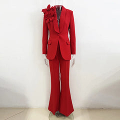 Mannequin wearing red suit jacket with floral detail and flared trousers