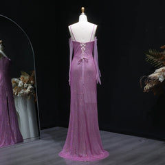 Purple evening gown on a mannequin against a dark background