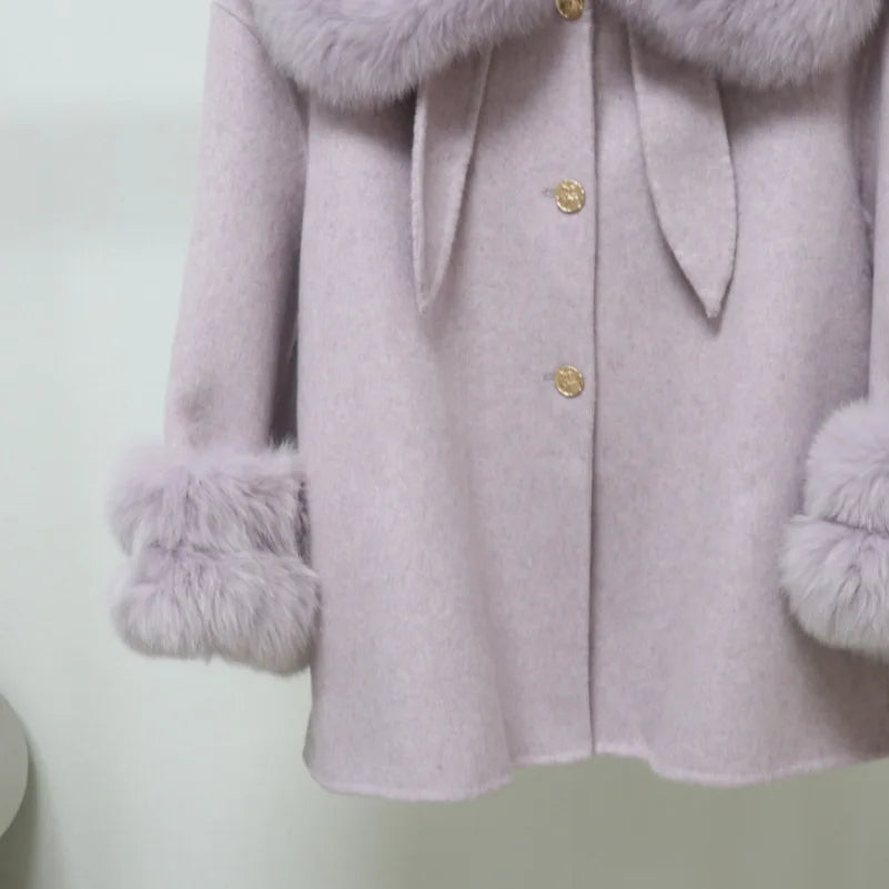Light purple coat with fur trim on a white background