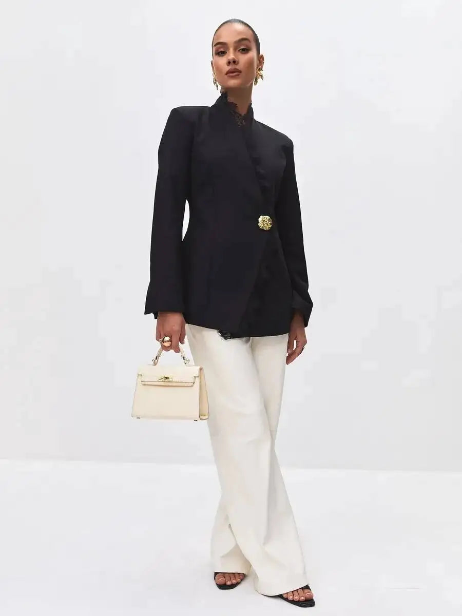 Model wearing black lace trim fitted waist blazer