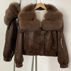 Brown leather jacket with fur collar on a hanger against a white background