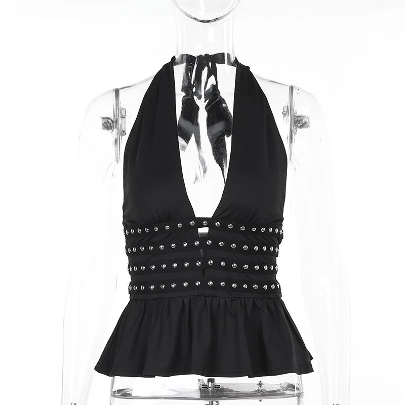 Black halter top with studded details on a mannequin against a white background