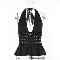 Black halter top with studded details on a mannequin against a white background