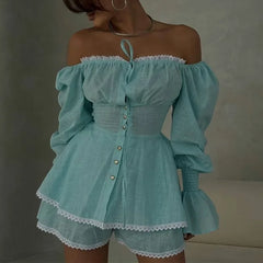 Light blue off-shoulder dress with lace details on a neutral background