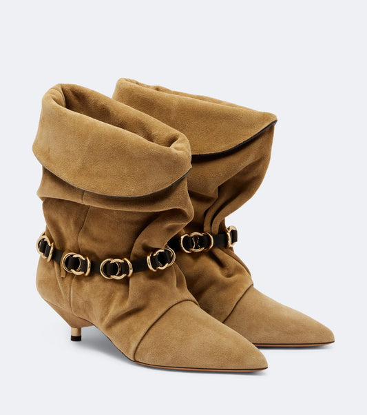 Pointed toe wrinkled ankle boots in apricot suede with gold hardware