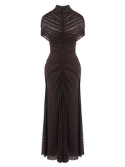 Black evening gown with sheer shoulder panels on a white background