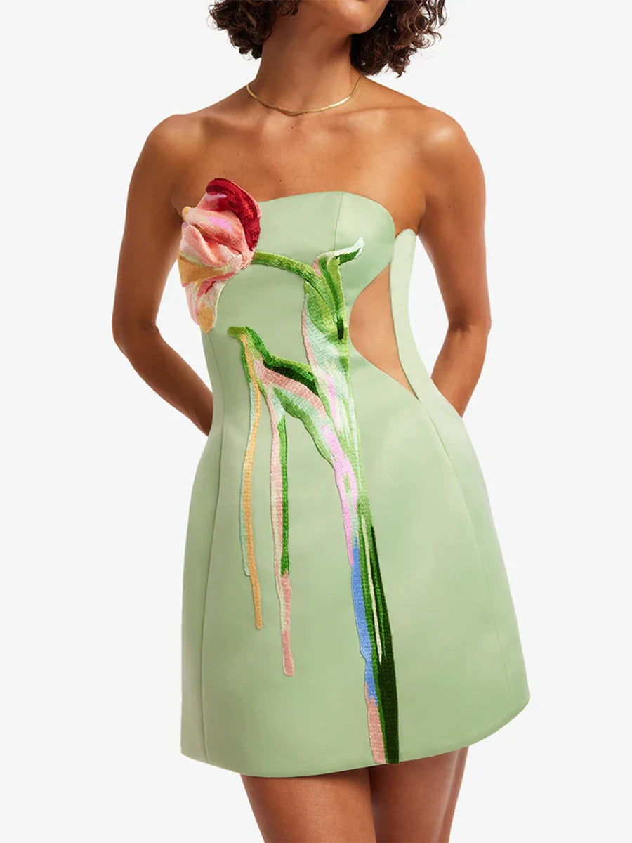 Strapless mini dress with floral appliqué and cut-out sides