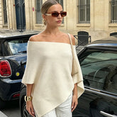Off-shoulder knit top with asymmetrical hem