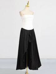 Mannequin wearing a white top and black skirt on a white background