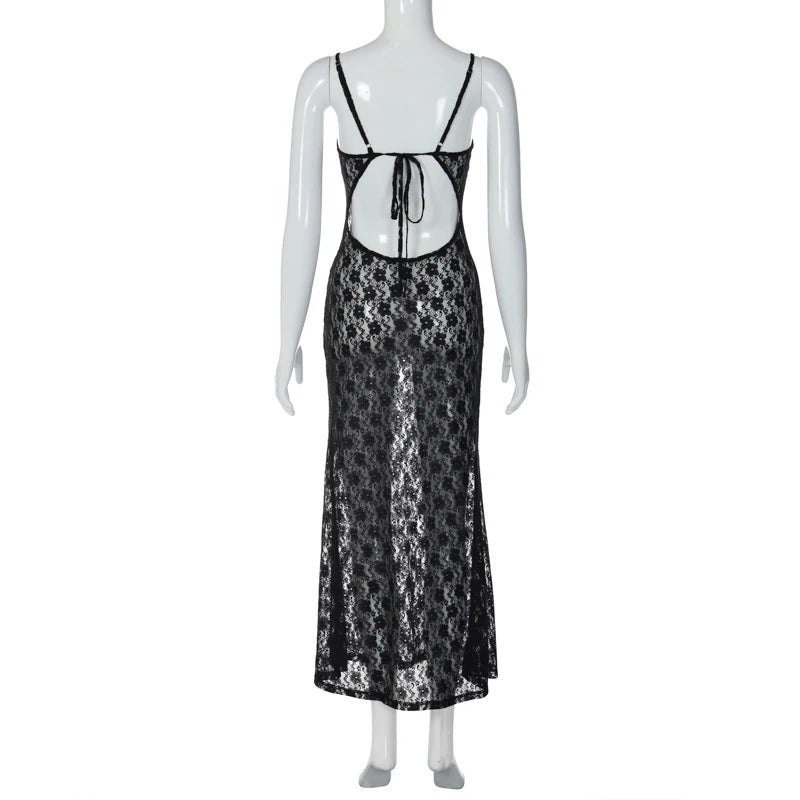 Mannequin wearing a black lace dress on a white background