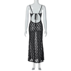 Mannequin wearing a black lace dress on a white background