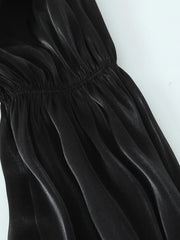 Black velvet fabric on a white background