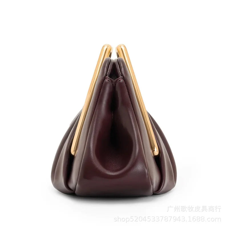 Brown handbag with gold handles