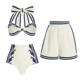 Striped halter bow bikini top and high-waisted shorts set laid flat