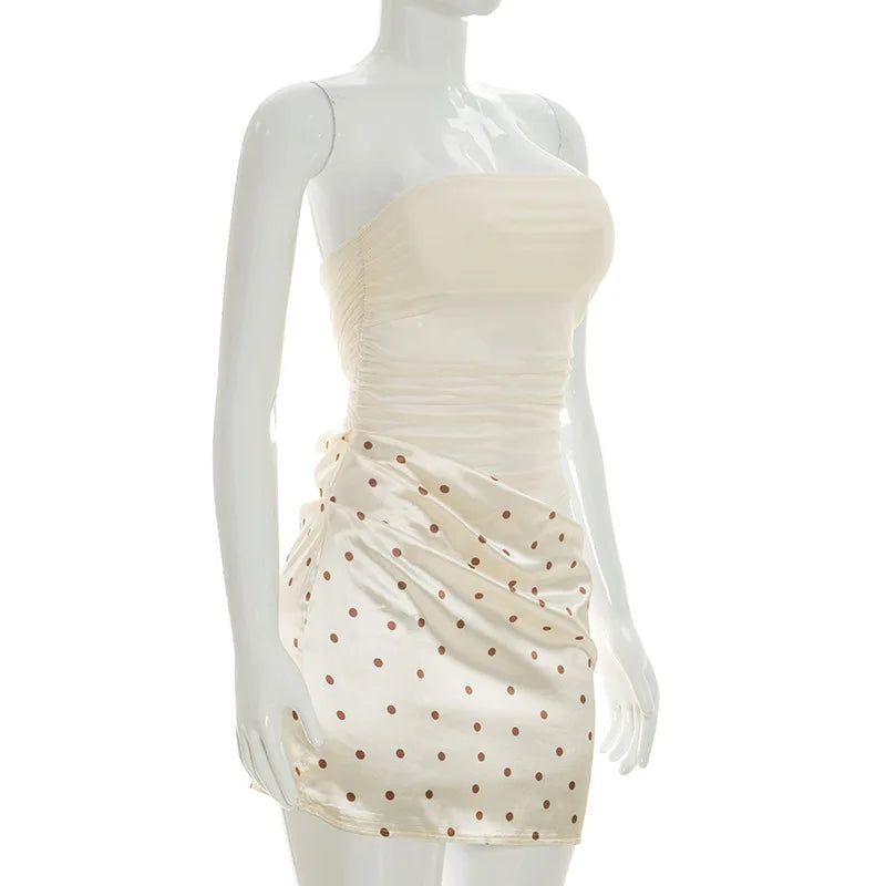 Polka dot cut-out mesh tube top mini dress on mannequin