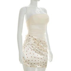 Polka dot cut-out mesh tube top mini dress on mannequin