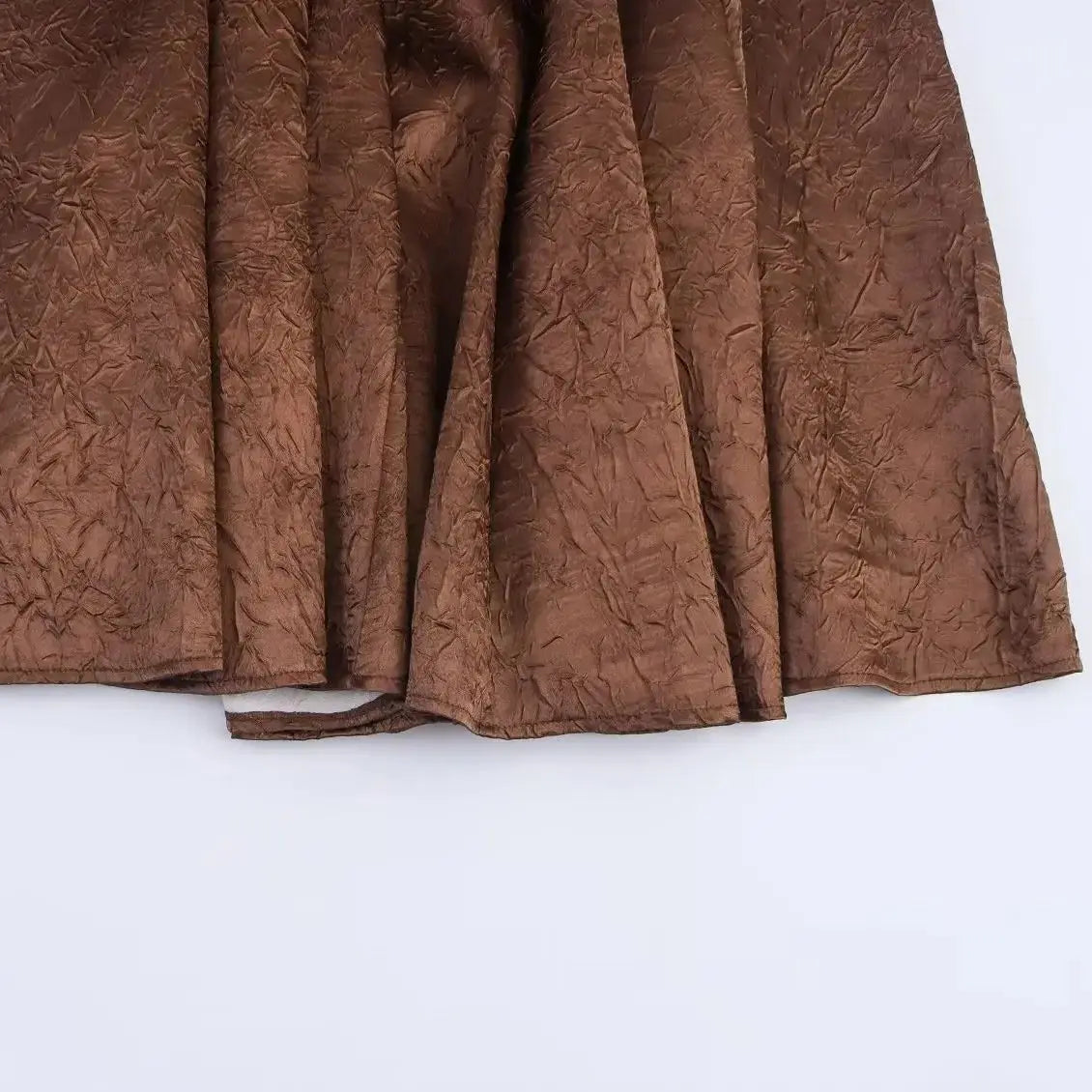 Brown textured fabric on a white background