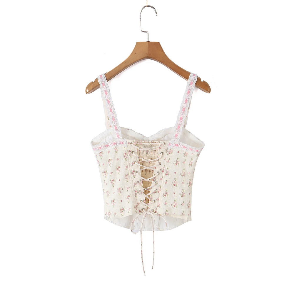 Floral print corset crop top back view showing lace-up detail.