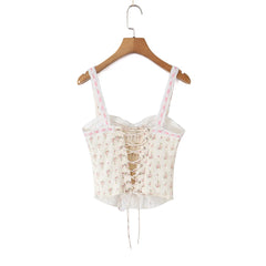 Floral print corset crop top back view showing lace-up detail.
