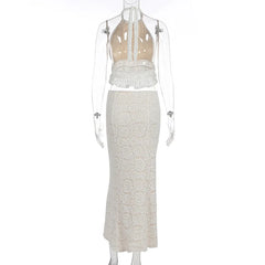 Mannequin wearing a beige halter top and skirt set