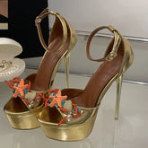 Platform stiletto heels in gold with starfish and bead embellishments.