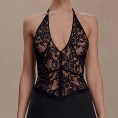 Back view of black lace halter bustier top showing tie detail.
